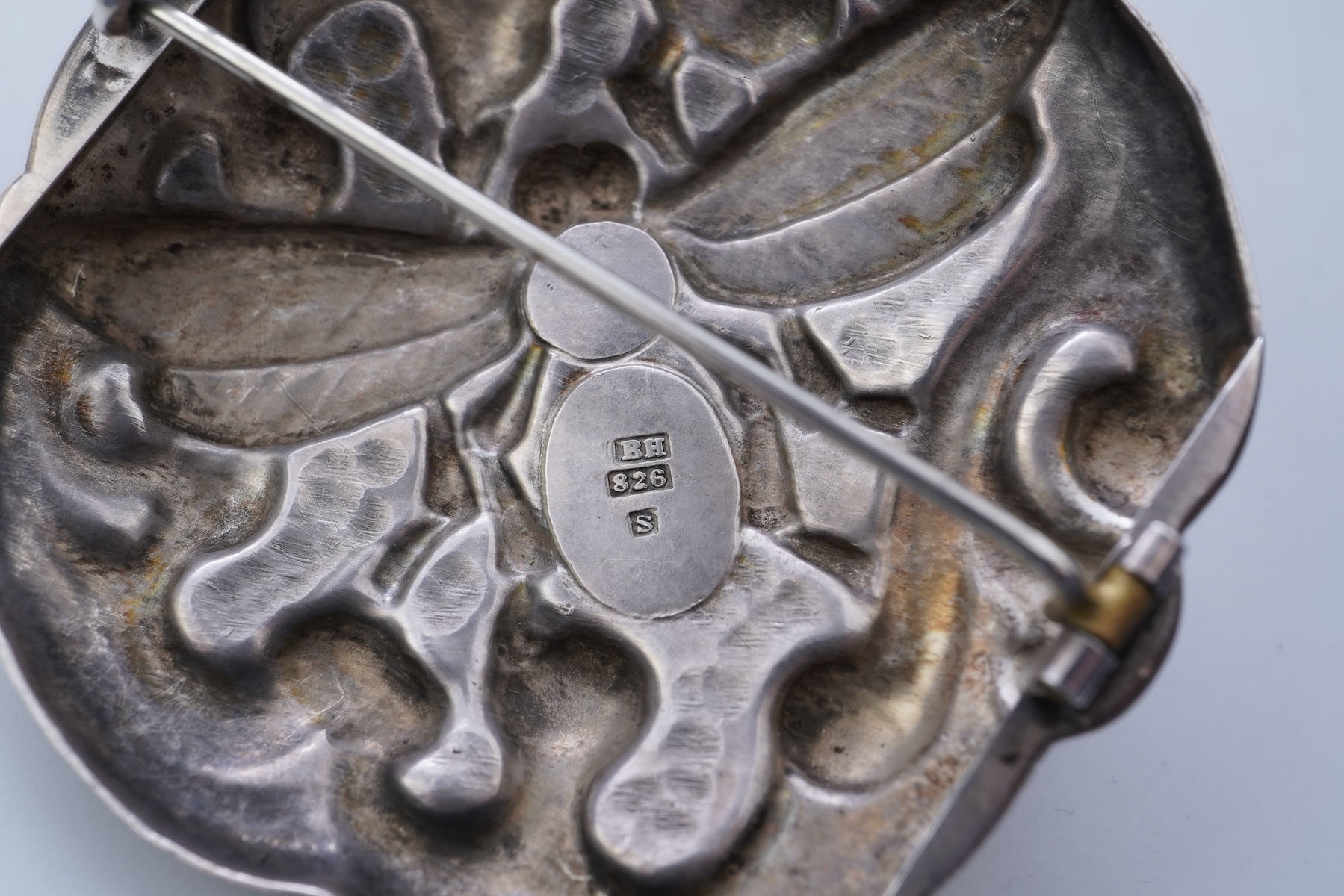 A collection of five Arts & Crafts silver brooches, Denmark, early-mid 20th century